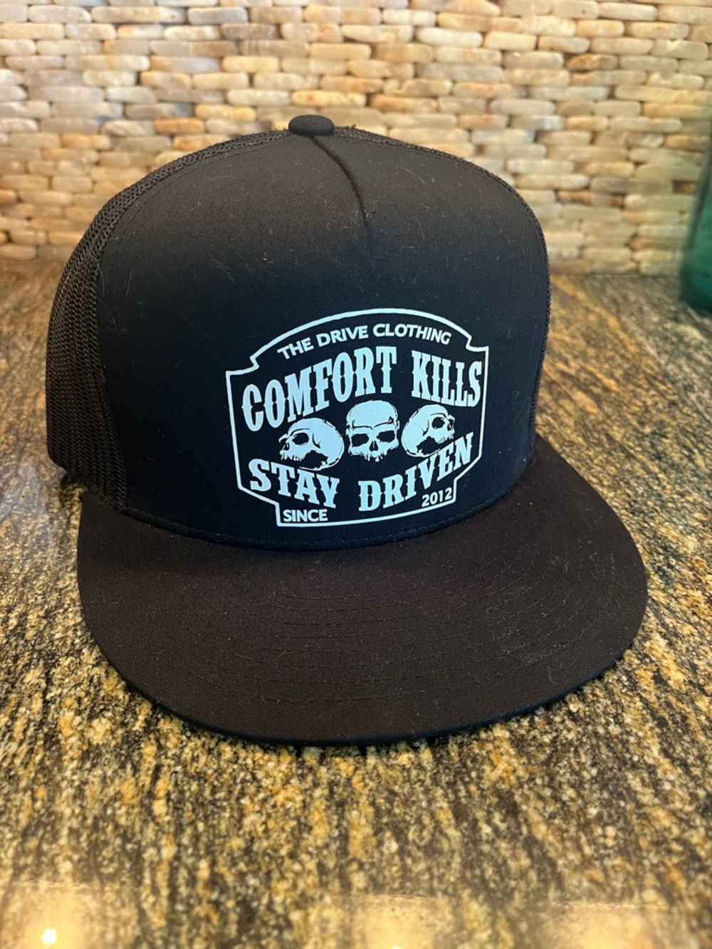 Comfort Kills Stay Driven Black Trucker Hat